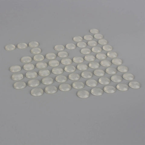 2 Inch Drawer Bumpers Set With Self Adhesive Silicone Feet For Quiet Cabinets And Drawers, placed on a grey surface