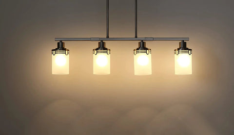 4 Light Kitchen Island Pendant Chandelier In Brushed Nickel Finish With Frosted Glass Cup Shades on dark background