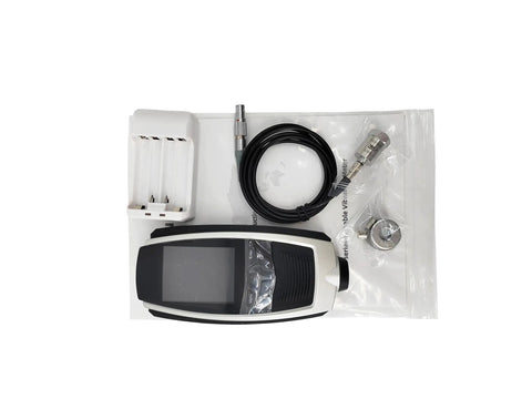 Heavy Duty Portable Vibration Analyzer Meter With Sick Precision And Kickass Build Quality For Measuring Acceleration Velocity Displacement On Industrial Machinery on a white background with accessories.