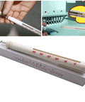 Pencil Style Thread Tension Gauge For Top Thread Tension Adjustment On Commercial Embroidery Machines Compatible With Tajima SWF And Ricoma Pro Grade Quick Readout show casing in use and boxed.