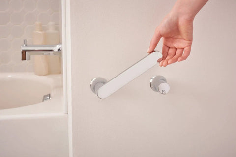 Genta LX Modern Wall Mount Pivoting Toilet Paper Holder in Chrome for Bathroom installation near bathtub