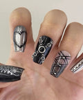 3D Metal Punk Nail Charms Set With Belt Spikes Rivets And Gothic Cross Studs In Silver Black White Mixed Sizes For Dope DIY Manicure Long Lasting Alloy Nail Art Accessories For Women, shown on black and silver nails