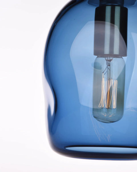Close-up of Dope Capri Blue Glass Pendant Lights Hand Blown Organic Globe With Gold Accents for Kitchen Island Ceiling Fixtures
