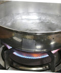Aluminum Repair Patches For Pots Pans And Cookware, 10 Sheets, Leak Stop Tapes on frying pan with water on stove