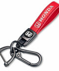 Hella Durable Red Leather Auto Keychain With Slick Zinc Alloy Strap Tough Key Fob Lanyard For Honda Accord Civic Crv Pilot showing red leather and black strap.