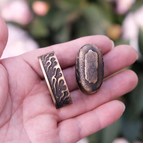 Dope Antique Copper Samurai Tsuba Fuchi Kashira Menuki Set With Dragon Phoenix Buddha Demon Floral Motif in hand