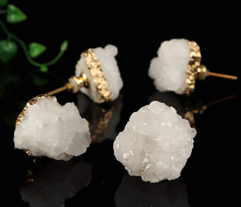 Four Pack Beefy Natural Quartz Geode Cabinet Knobs Combined With Slick Druzy Crystal Drawer Handles Featuring Clean Gold Plated Edges And Heavy Duty Stone Pulls For Kitchen Vanity Refresh, shown from above with shiny druzy finish.
