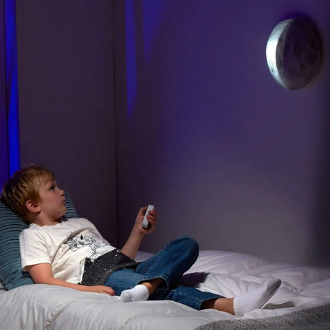 Child using Moon In My Room Light Up Lunar Phases Kit With Remote Control Or Automatic Mode STEM Toy For Kids Ages 6 And Up