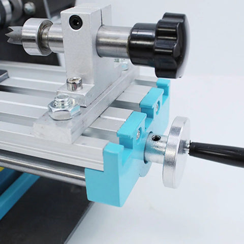 Close-up of Compact Mini Metal Lathe And Wood Beads Machine With 7 Speed Adjustable Settings Up To 7000 Rpm showing aluminum tailstock.