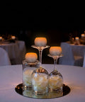 Small Real Wax Flameless Candles with Silver Glitter, LED Flicker, Battery Included, 3 Pack on glass holders in dim setting