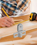 Heavy Duty Zinc Alloy Door Pivot Hinges For Glass Shower Doors With Silver Finish Easy Install Bidirectional Swing Secure And Stable Ideal For Bathroom And Home Use displayed on a wooden surface during measurement with a tape measure and pencil in hand.