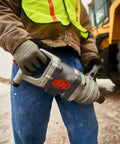 Heavy Duty 1 1/2 Inch Air Impact Wrench With D Handle in use, delivering 4500 Ft Lbs max reverse torque for tough garage work.
