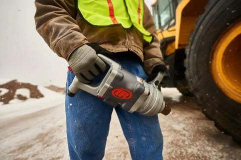 Heavy Duty 1 1/2 Inch Air Impact Wrench With D Handle in use, delivering 4500 Ft Lbs max reverse torque for tough garage work.