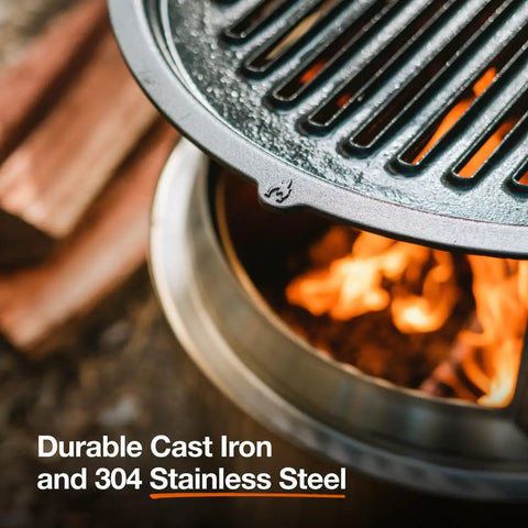 Close-up of Bonfire Grill Top And Hub Cast Iron Cooktop With Stainless Steel Hub over fire pit, showing flames and grill texture.