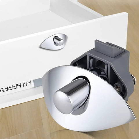 Kick Rattling Doors To The Curb With These Sleek Push Button Cabinet Handles That Keep Your Yacht Or Boat Drawers Secure And Tight, Ensuring Zero Spills No Matter How Rough The Waters Get While Adding A Clean Modern Look To Any Kitchen Cupboard Or - Chrome push button handle with a gray base design for marine use.