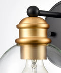 Close-up of Modern Farmhouse Black And Gold Bathroom Wall Sconces globe with wrought iron frame and handcrafted glass globes.