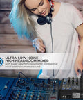 DJ using 4 Channel Digital USB Bluetooth Pro Audio Mixer With MP3 Playback, USB Flash and PC Input, 48V Phantom Power on studio console.