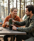Couple using Ultra Portable Espresso Maker With Self Heating Tech On The Go, 8 Cups Per Charge And 20 Bar Pressure at campsite