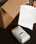 100 Pcs White Foam Pouches For Fragile Packing And Cushioning Heavy Duty Shockproof Elastic Foam Wraps displayed with cardboard box
