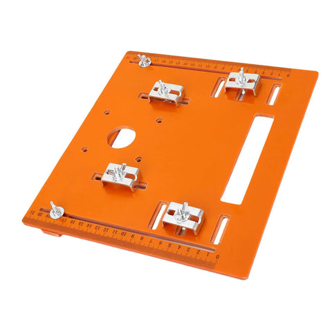 Pro Grade Aluminum Circular Saw Base Plate And Router Table Insert featuring orange surface and metal clamps for accurate cuts.
