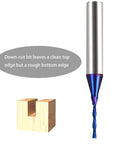 Side view of blue-coated carbide plunge-down end mill, 1/16 in dia, 1/4 in shank, with wooden block.