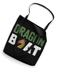 Black tote bag featuring 'Dragon Boat Racing Paddler Tote Bag For Dragonboating Fans And Crew Members Dope Gear For Men And Women Who Love Synchronous Paddling At Festivals And Team Rides' with dragon design.