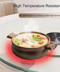 Big Glass Lazy Susan Rotating Turntable For Dining Table Display with soup pot, showcasing high temperature resistance.