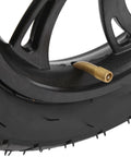 Close-up of 12 Inch Electric Scooter Tire with Wheel Hub Rubber Tyre Replacement 12 1/2 X 2 1/4 showing valve and tread detail.