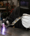 Ultimate TIG Wire Feeder Tool With Magnetic Base And Heat Shield For Alloy Filler Rods guiding wire during TIG welding process.