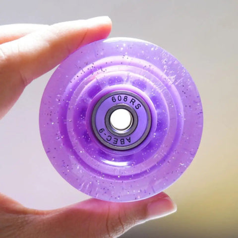 Close-up of Glitter Purple 82A Quad Roller Skate Wheels 4 Pack PU Replacement Wheels For Outdoor Indoor Use Durable Sturdy Skating Parts