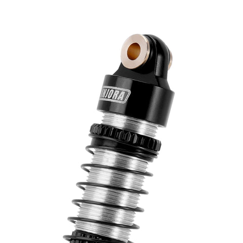 Close-up of Sweet 53mm 6g Oil Filled Threaded RC Shocks Absorbers For 1 By 18 TRX4M TRX4MT Crawler Upgrade Aluminum Bodies