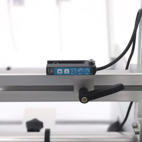 High precision fiber sensor on Semi Automatic Label Applicator Round Bottle Labeling Machine for efficient labeling.