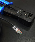RJ45 Crimping Tool Ethernet Crimper for Cat6 Cat6a Cat5e Cat5 and RJ12 Ends Pass Through Connectors Compatible next to cable on table
