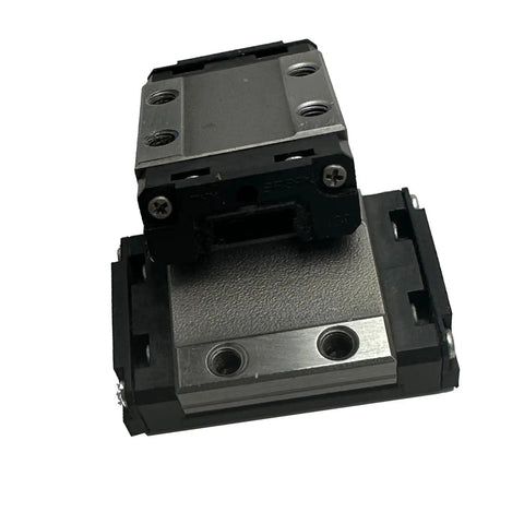 Close-up of One Piece Slip Joint Linear Guide Block Rail Kit with Lift Off Carriage, showcasing mounting holes and carriage detail.