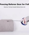 Electronic Fencing Referee Sensor For Foil And Epee Training, Pro Grade Scoring Detection in action, white and silver unit