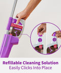 Click N Clean Multi Surface Spray Mop All In One Kit bottle adapter being attached to mop handle, easy click mechanism.