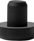 Close-up of black nylon stem bumper from Patio Swivel Rocker Chair Floor Protectors One Half Inch Nylon Stem Bumpers 25 Pack Black For Outdoor Furniture Feet No Scratch On Floors Durable Floor Friendly Design For Indoor And Outdoor Use.