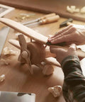 Person sanding wooden model plane with Assorted Sandpaper Sheets 400 600 800 1000 1200 1500 Two Sheets Each Dry Wet Waterproof 9 x 3.6 Inch For Wood Furniture Hobbies And Home Improvement Pro Grade Sanding Set Perfect For Sanding Polishing Plastics Glass.