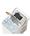 Slick Countertop Portable Nugget Ice Maker With Hella Quick Freezing Ability And Easy Self Cleaning System Holding Twenty Six Pounds Of Chunky Ice visible with ice inside.