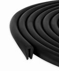 Close-up of Black EPDM U Channel Edge Trim Seal 15/32 In High By 19/64 In Wide Flexible Durable Edge Guard coiled, showing channel detail