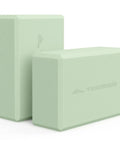 Premium Soft Foam Yoga Blocks For Pilates And Meditation Lightweight Odorless Cushioned Supports For Stretching Toning and Daily Fitness Killer Comfort Mint Green two pack stacked showing textured surface.