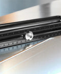 Close-up of adjustable hole cutter on sheet metal, 2 to 20 inch, cuts 20 gauge galvanized steel, impact ready, high speed bearings.