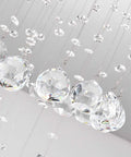 Close-up of K9 crystal balls on Spiral Crystal Raindrop Chandelier With Five Lights, Modern Flush Mount Round Pendant Lighting