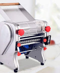 Compact Automatic Electric Pasta Maker For Fresh Homemade Noodles, stainless steel construction, nonstick rollers, easy to use.