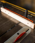 Next Level Miter Gauge with 22-to-36-Inch Extension Fence and 27 Positive Angle Stops in use on a table saw for precise cuts.