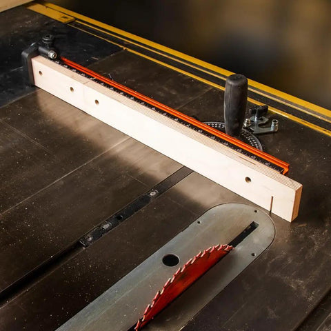 Next Level Miter Gauge with 22-to-36-Inch Extension Fence and 27 Positive Angle Stops in use on a table saw for precise cuts.