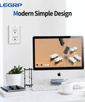 Premium Matte White Decorator Receptacle Outlets 15A 125V No Fuss Tamper Resistant Sockets With Matching Wall Plates on wall.
