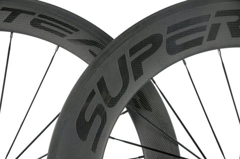 Close-up of Carbon Clincher Wheelset 700C Road Bicycle Wheels With 60 And 88mm V Shape Depth Basalt Braking Surface 3K Matte Finish