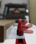 Close-up of Dead Simple Quick Swap Cam Stops for Router Tables with T Track Clamps, low profile aluminum design.