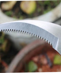Close-up of serrated steel blade on Root Digger Sickle With Serrated Hook For Weeds And Lawn Care Garden Tools Set